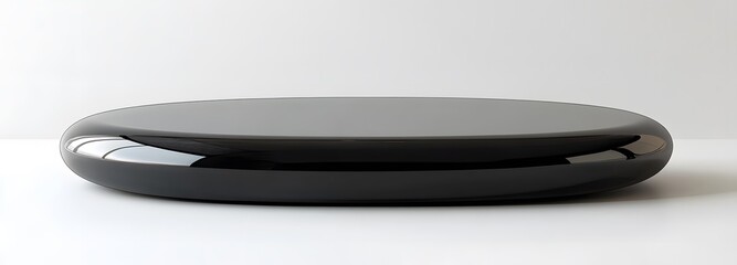 A polished black podium with smooth, reflective surface, positioned on a white, minimalist background