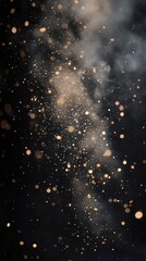 Obraz premium Abstract Gold Dust and Smoke Particles on Black Background Sparkling Glimmering Texture for Design