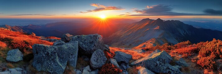 Naklejka premium Breathtaking Panorama of Majestic Mountain Landscape in Autumn with Stunning Sunset Over Rolling Hills and Vibrant Foliage