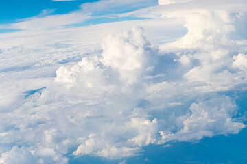 Fototapeta premium Blue sky with clouds in the sky. Beautiful blue sky background with clouds.Natural and cloudy fresh blue sky background. White fluffy clouds in the blue sky.