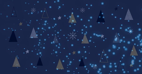Fototapeta premium Image of snow falling over christmas trees and stars in winter scenery