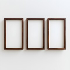 Photo of Three Wooden Frames on a Minimalist Wall