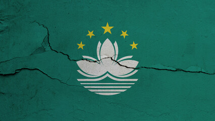 Macau flag on cracked wall background, flag with crack line