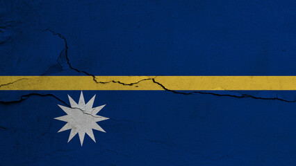 Nauru flag on cracked wall background, flag with crack line