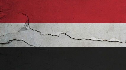 Yemen flag on cracked wall background, flag with crack line