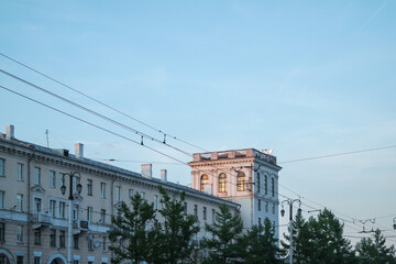 View of building facades after sunset