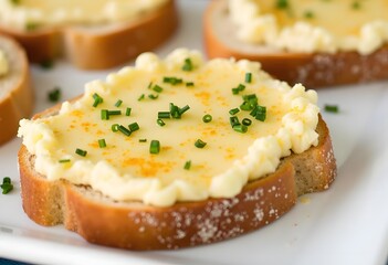Selective focus on the front bread with melted cheese on top
