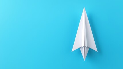 Fototapeta premium Single Paper Airplane on a Blue Background - Minimalistic, Creative and Simple Design Concept