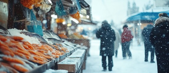 Obraz premium Winter fish market scene with fresh seafood display and snowfall, ideal for seasonal promotions or culinary advertisements.