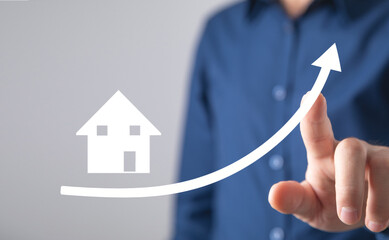 Real Estate Investment. Rising arrow with a house