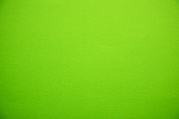 Green paper background or texture. Empty space