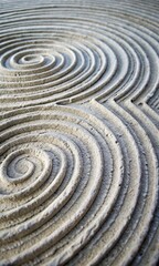Artistic zen garden inspired sand patterns forming concentric spirals with a tranquil vibe, perfect for mobile wallpaper background