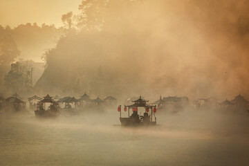 Fototapeta premium Morning mist on the water surface