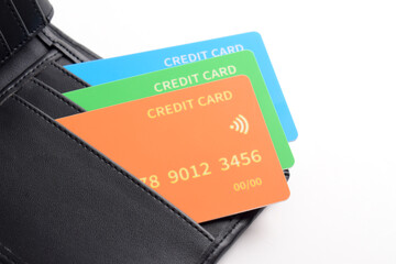 Credit cards in wallet isolated on white background