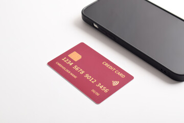 smartphone and credit card isolated on white background. Mobile payment ,Online shopping concept