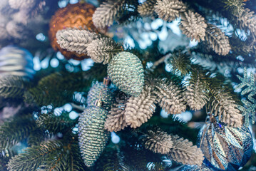 Christmas background-colored toys hang on the Christmas tree
