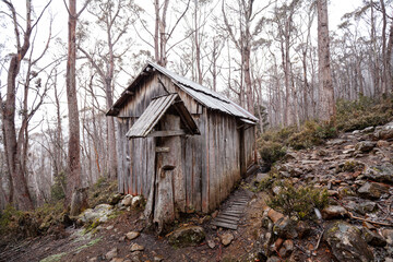 Trapper's Hut and snowfall in the Walls of Jerusalem National Park on the plateau. Walking Track in Tasmanian Wilderness.