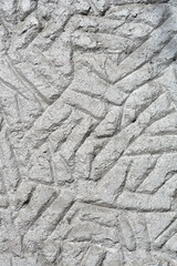 Detail of a silver painted rough wall