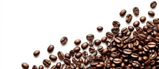 Dark Brown Roasted Coffee Beans Scattered on White Scattering a few