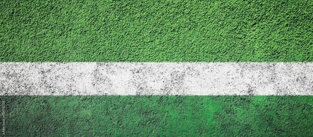 Poster green textured asphalt with white line and empty space for text or graphic design usage