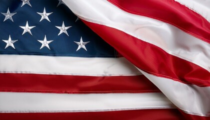 Obraz premium A close up of the US flag waving in the wind for Memorial Day or 4th of July