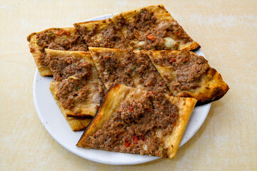 Kiymali pide.Turkish pide with minced meat. Turkish pizza mince pita Pide on white . Etli ekmek.Kusbasi kasarli, kiymali kasarli, kiymali yumurtali, Bafra, Trabzon, Kusbasili pide. Urfa acili lahmacun