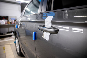 Naklejka premium new car in car service for installation of additional equipment
