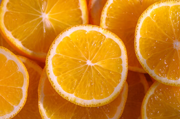 Freshly sliced oranges arranged beautifully for a vibrant culinary display in a sunny kitchen