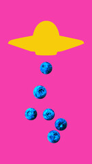 Contemporary art collage. Yellow UFO hovering above pink background. Blueberries fall from UFO. Surreal, playful image. Concept of summer, recreation, fun and joy, tourism. Ad