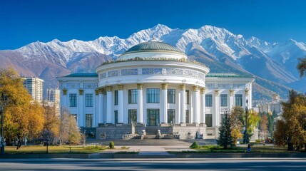 Majestic White Building Against Snowy Mountains