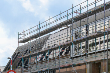 Repairs to building facades and roofs require scaffolding
