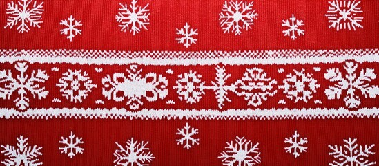 Obraz premium Festive red sweater pattern with white snowflakes ideal for holiday promotions and gift packaging copy space for messages or greetings