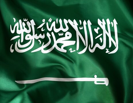Saudi Arabia national flag waving with skyline and buildings