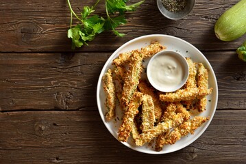 Crunchy zucchini breaded sticks with dip sauce