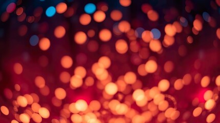 A de-focused abstract background featuring shimmering glitter lights in blue, gold, and black hues.