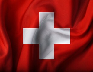 Top view of a Swiss flag on a white surface, featuring ample empty space for text