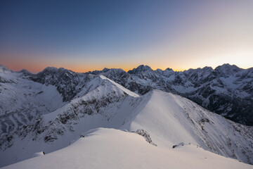 Winter in the high mountains of the Slovak Tatras during sunset