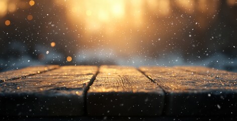 Fototapeta premium Sparkling Snowfall on Wooden Surface at Sunset, Capturing a Magical Winter Atmosphere with Glowing Bokeh Lights and Soft Falling Snowflakes in a Scenic Outdoor Setting