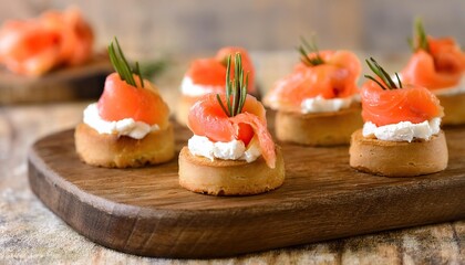 Festive Bites Smoked Salmon Canapes with Cream Cheese and Rosemary Garnishes on a Rustic Wooden Board