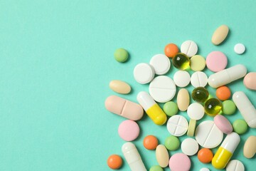 Various pills on a colored background
