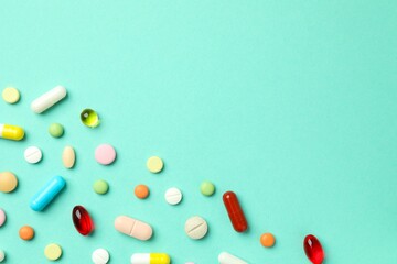 Various pills on a colored background