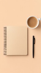 Aerial View of a Blank Spiral Notebook, Black Pen, and Cup of Coffee on Neutral Background for Creative Inspiration and Productive Ideas