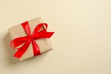 Beautiful gift box on color background