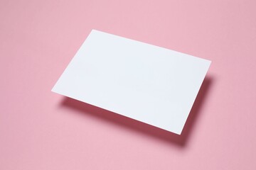 Paper card on color background