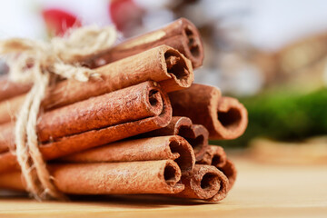 Brown cinnamon sticks on the table.