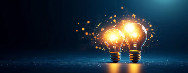 Glowing light bulbs emitting warm light with scattered particles on dark background
