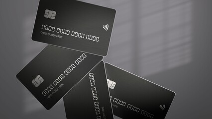 Floating black credit cards in minimalistic setting.
