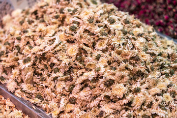 A Colorful Display of Dried Flowers in a Vibrant Market