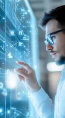 Young Professional Engaged with Futuristic Technology Interface Displaying Digital Icons and Data Representations in a Modern Workspace Environment