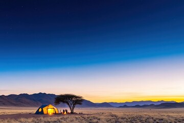 Fototapeta premium Serene Night Camping Under the Stars in a Desert Landscape with a Tent and Campfire Illuminating the Scene Against a Gradient Sky at Dusk